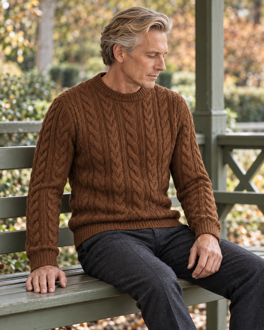 Cable Knit Jumper Rustic Heritage in chestnut brown — Styled in a garden