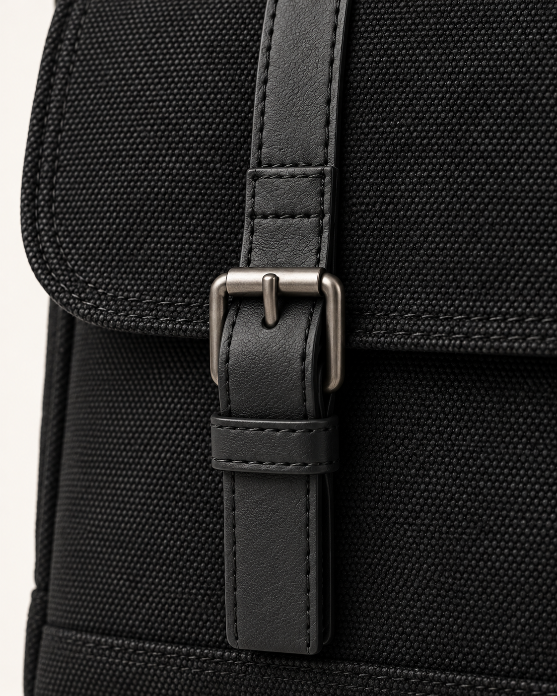 Metal buckle and black strap detail of the Canvas Messenger Bag Urban Refined